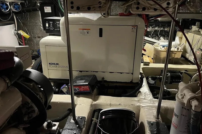 Kiki's Tiki Yacht Photos Pics Engine room of a 2000 Carver 506 Motor Yacht with Kohler power systems.