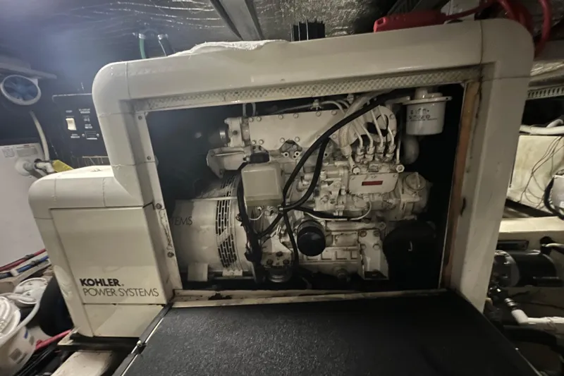 Kiki's Tiki Yacht Photos Pics Engine room of 2000 Carver 506 Motor Yacht with Kohler power system.