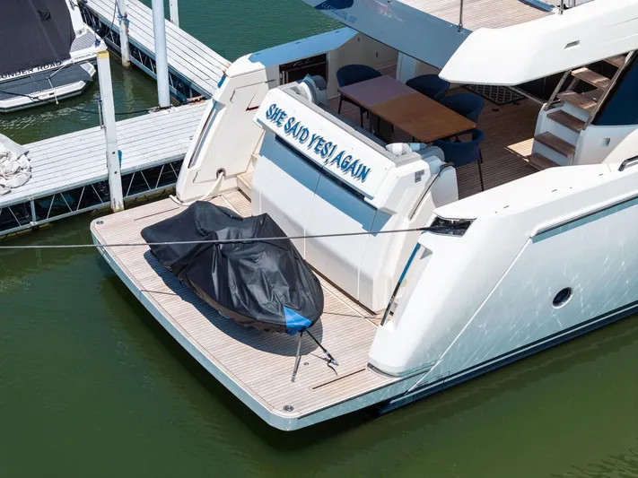 She Said Yes! Again Yacht Photos Pics 2018 Ferretti Yachts 780 docked, featuring spacious deck and covered equipment.