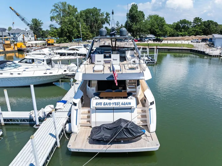 She Said Yes! Again Yacht Photos Pics 2018 Ferretti Yachts 780 docked, rear view with "She Said Yes! Again" sign.