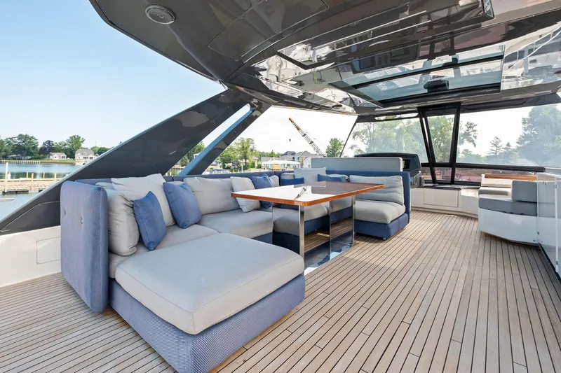 She Said Yes! Again Yacht Photos Pics Luxurious 2018 Ferretti Yachts 780 interior with elegant seating and wooden flooring.