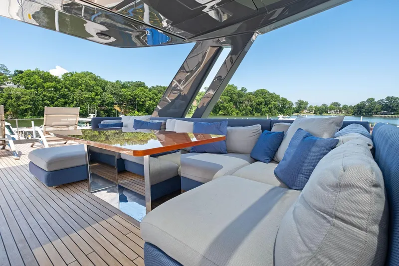 She Said Yes! Again Yacht Photos Pics Luxurious 2018 Ferretti Yachts 780 deck with plush seating and scenic water view.