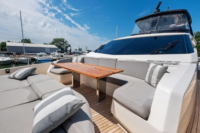 She Said Yes! Again Yacht Photos Pics Luxurious 2018 Ferretti Yachts 780 with elegant outdoor seating and table, docked at marina.