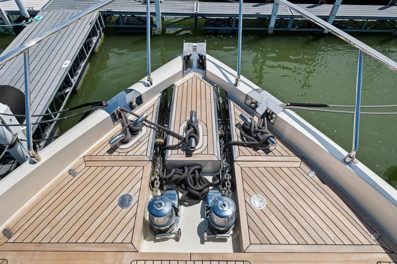She Said Yes! Again Yacht Photos Pics Bow of 2018 Ferretti Yachts 780 with teak decking and mooring equipment.