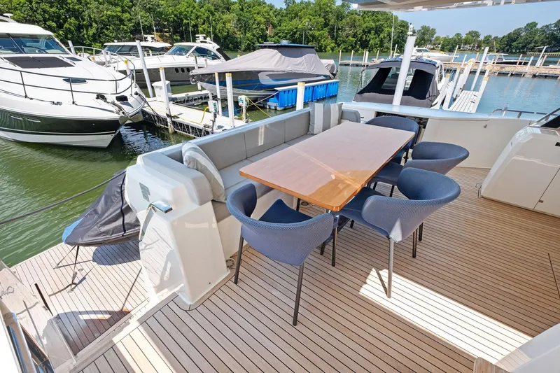 She Said Yes! Again Yacht Photos Pics Luxurious 2018 Ferretti Yachts 780 with elegant outdoor dining area at marina.