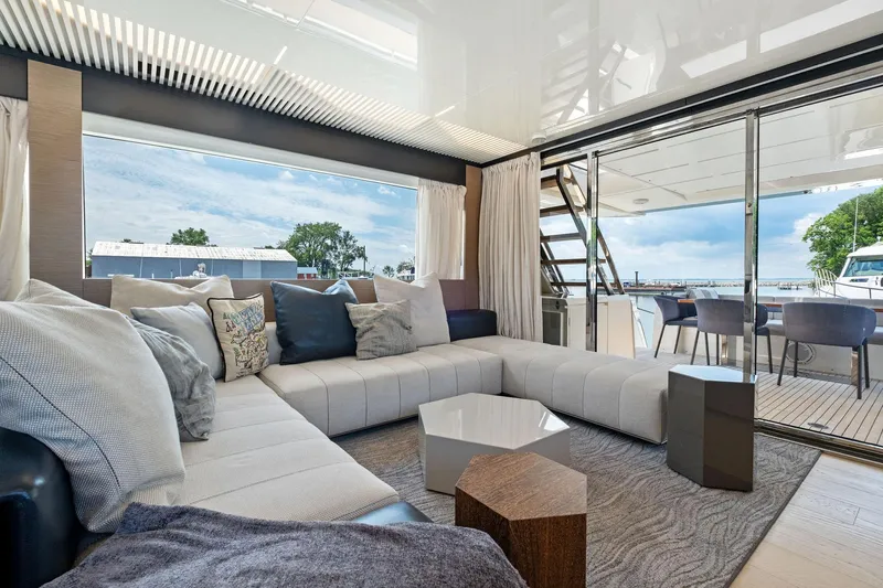 She Said Yes! Again Yacht Photos Pics Luxurious interior of 2018 Ferretti Yachts 780 with modern seating and outdoor view.