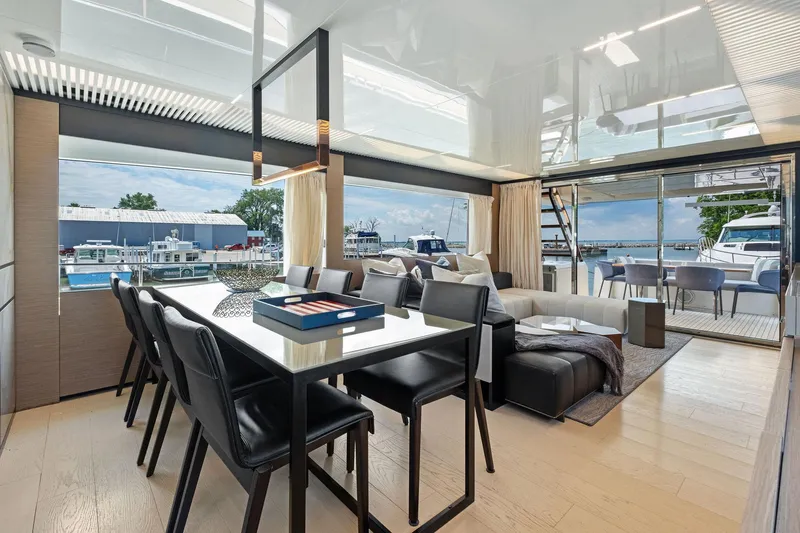 She Said Yes! Again Yacht Photos Pics Luxurious interior of 2018 Ferretti Yachts 780 with elegant dining and lounge area.