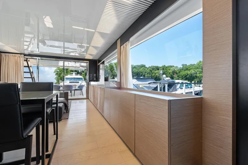 She Said Yes! Again Yacht Photos Pics Luxurious interior of 2018 Ferretti Yachts 780 with modern design and marina view.