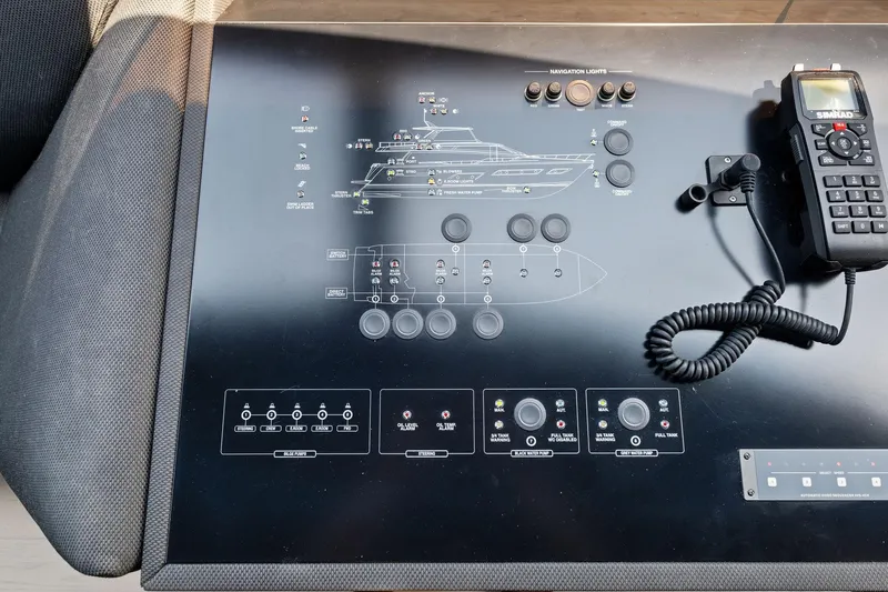 She Said Yes! Again Yacht Photos Pics Control panel of a 2018 Ferretti Yachts 780 with navigation and communication equipment.