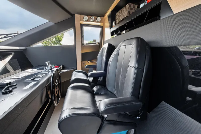 She Said Yes! Again Yacht Photos Pics Pilot seats and control panel in 2018 Ferretti Yachts 780 cockpit.