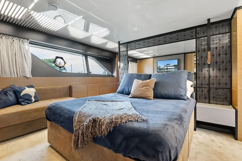She Said Yes! Again Yacht Photos Pics Luxurious bedroom interior of 2018 Ferretti Yachts 780, featuring modern design and comfortable furnishings.