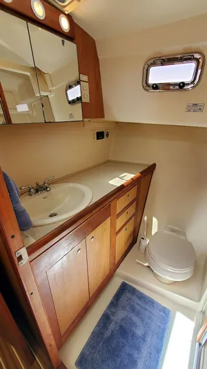 Mackinac Passage III Yacht Photos Pics Guest Head Vanity and Toilet
