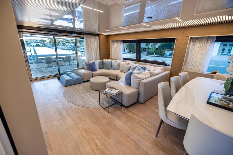 Life: For Sale Yacht Photos Pics Luxurious interior of 2021 Ferretti Yachts 920 with elegant seating and dining area.