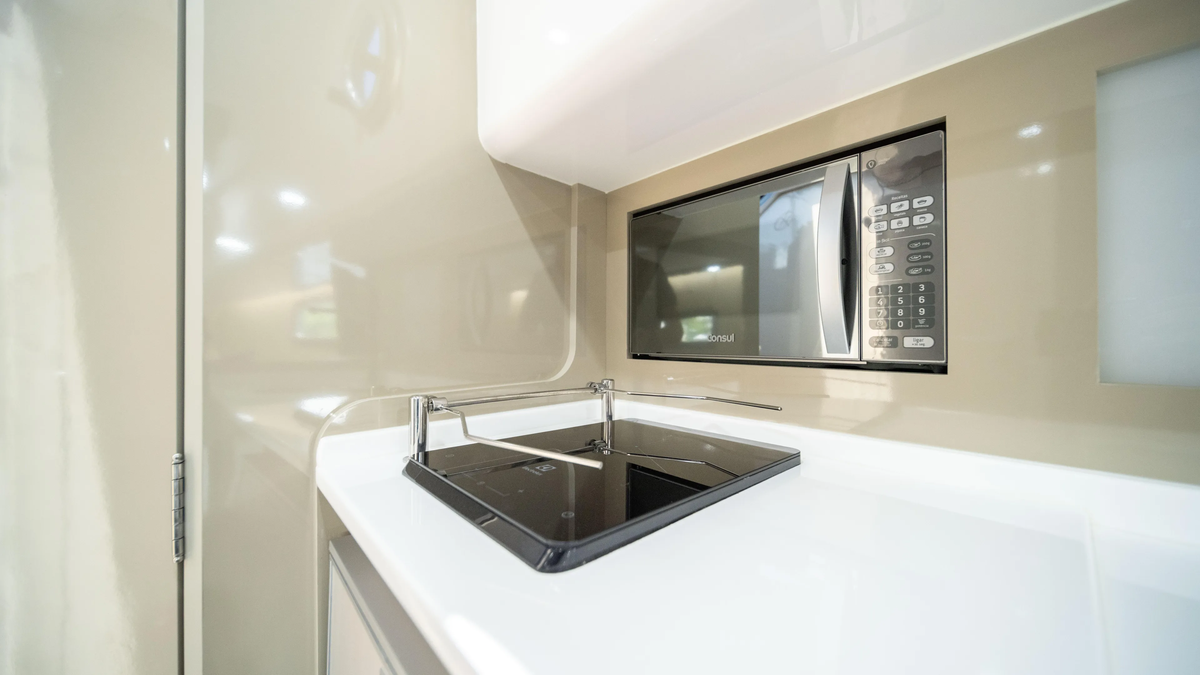 Custom Order Yours Today! Yacht Photos Pics Modern kitchenette in 2025 Hanover 387 Outboard with stove and microwave.