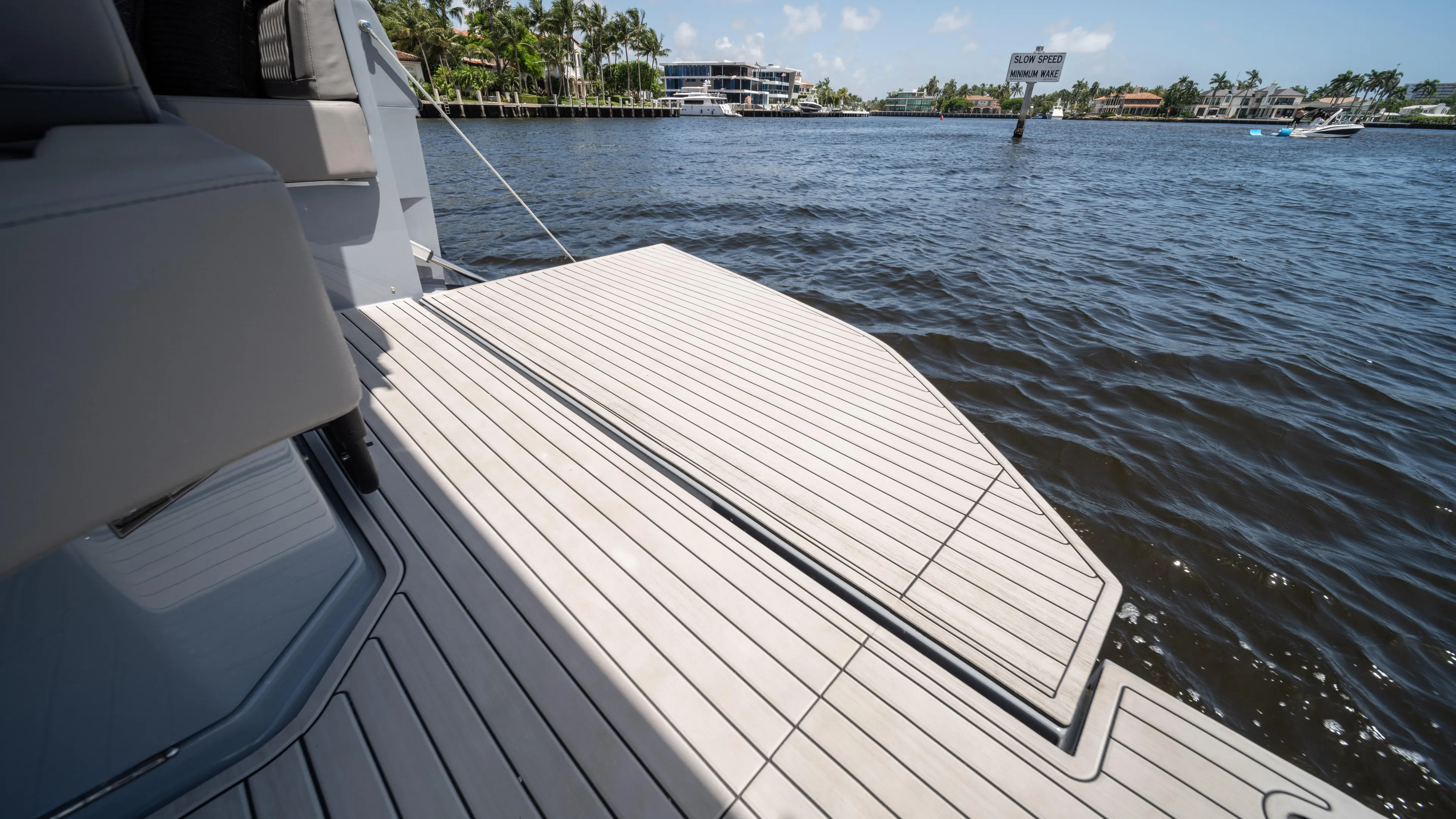 Custom Order Yours Today! Yacht Photos Pics Hanover 387 Outboard 2025 boat deck overlooking serene waterway.