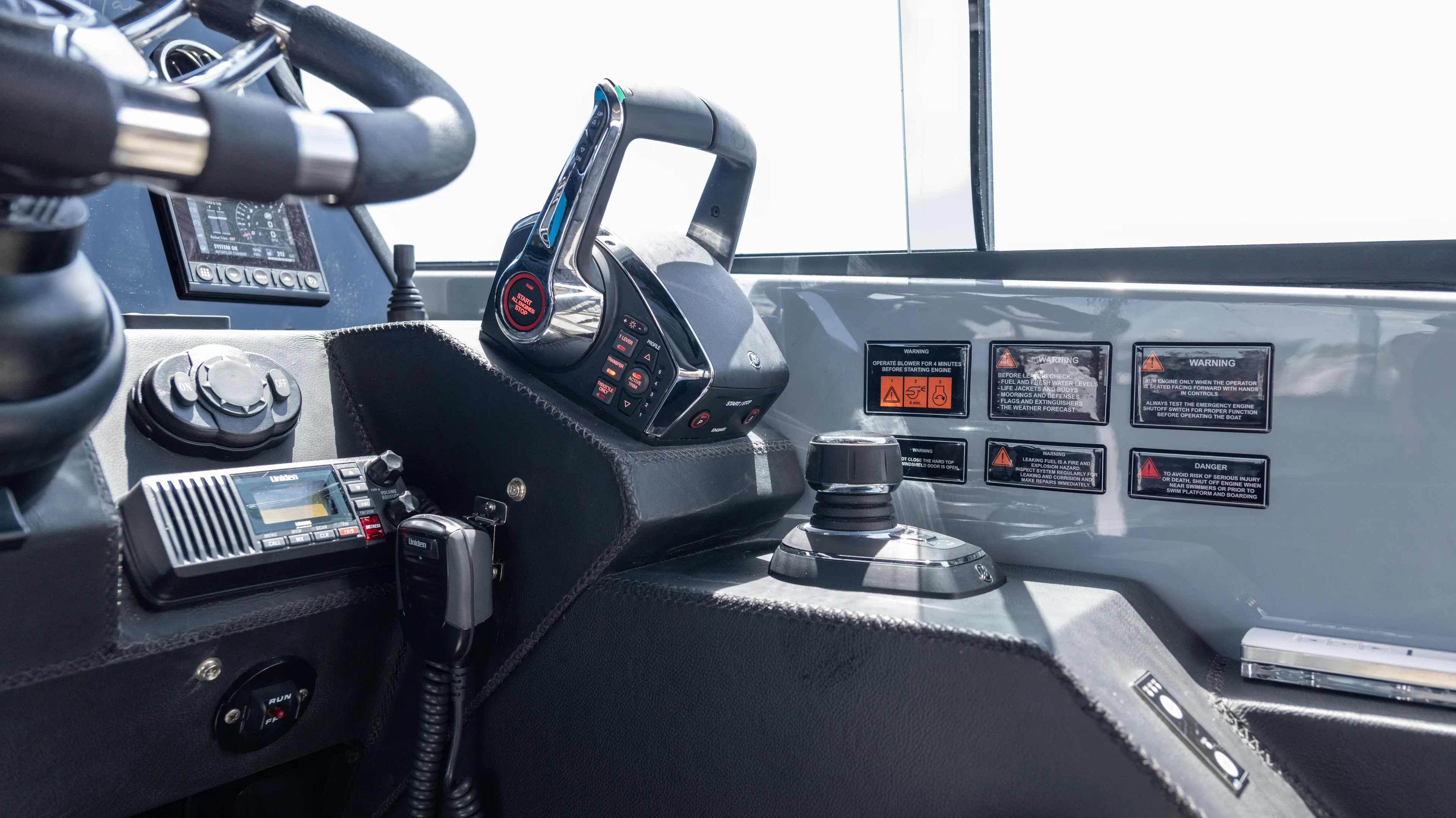 Custom Order Yours Today! Yacht Photos Pics 2025 Hanover 387 Outboard boat cockpit with modern controls and navigation equipment.