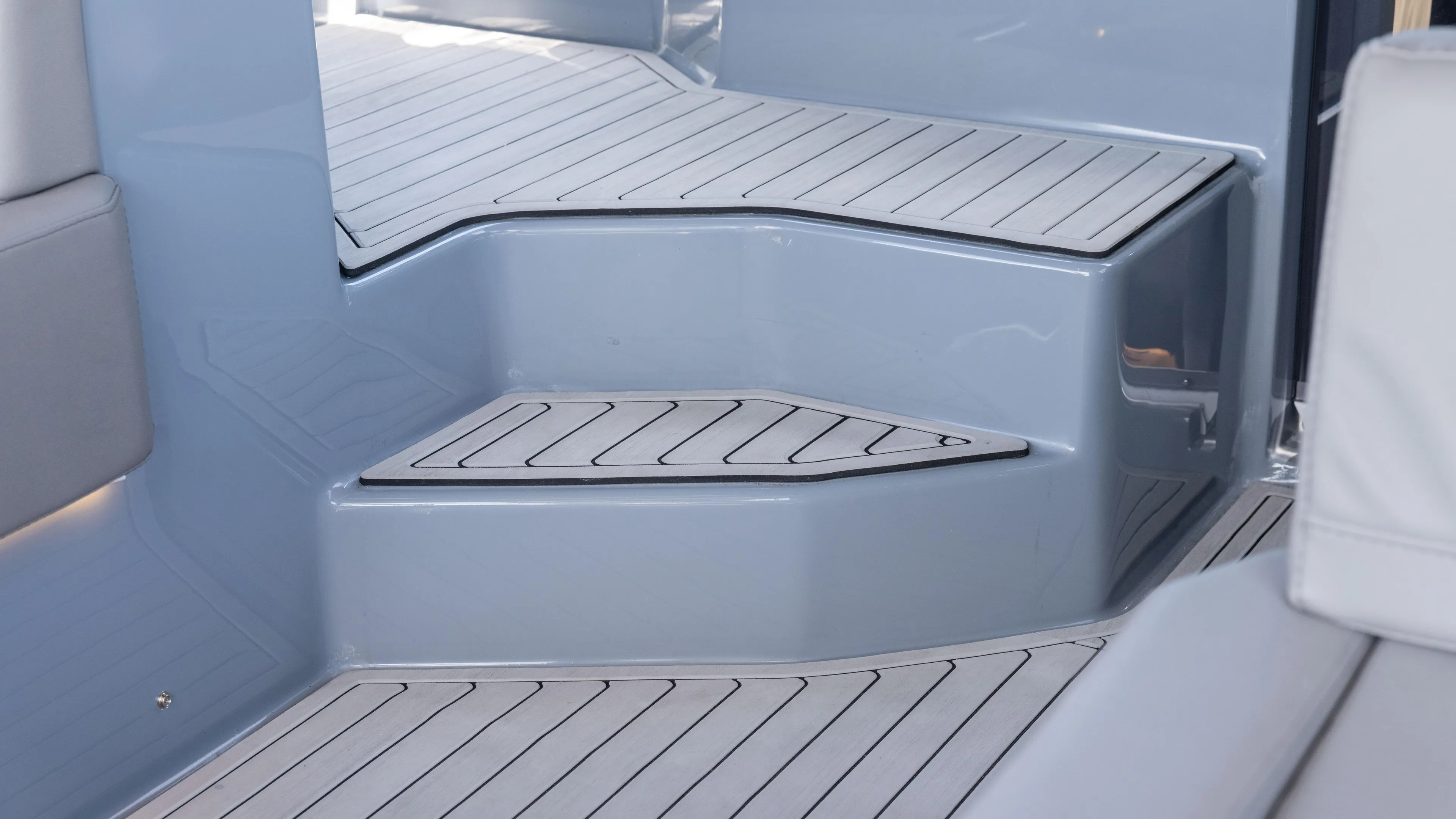 Custom Order Yours Today! Yacht Photos Pics 2025 Hanover 387 Outboard boat interior steps with sleek, modern design.