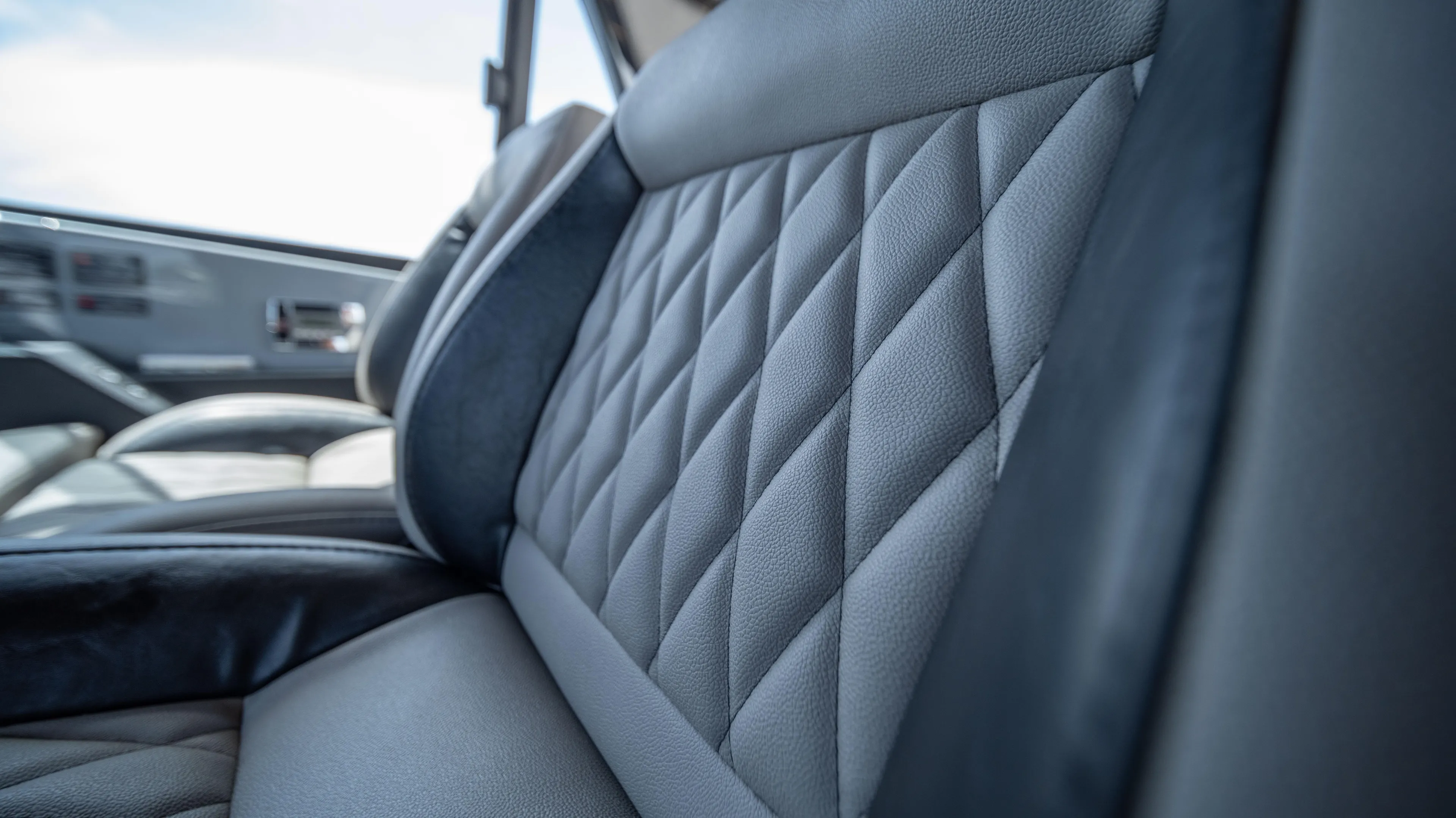 Custom Order Yours Today! Yacht Photos Pics Luxurious interior of 2025 Hanover 387 Outboard with quilted leather seating.