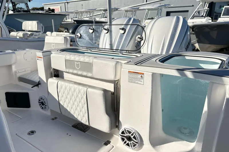  Yacht Photos Pics 2026 Sea Fox 288 Commander boat interior with seating and storage compartments.