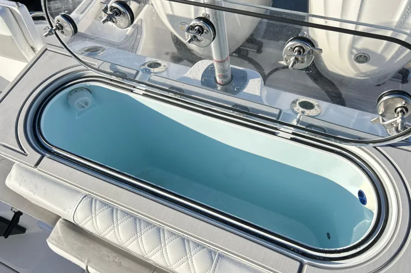  Yacht Photos Pics Livewell on 2026 Sea Fox 288 Commander boat, featuring a sleek design and secure lid.
