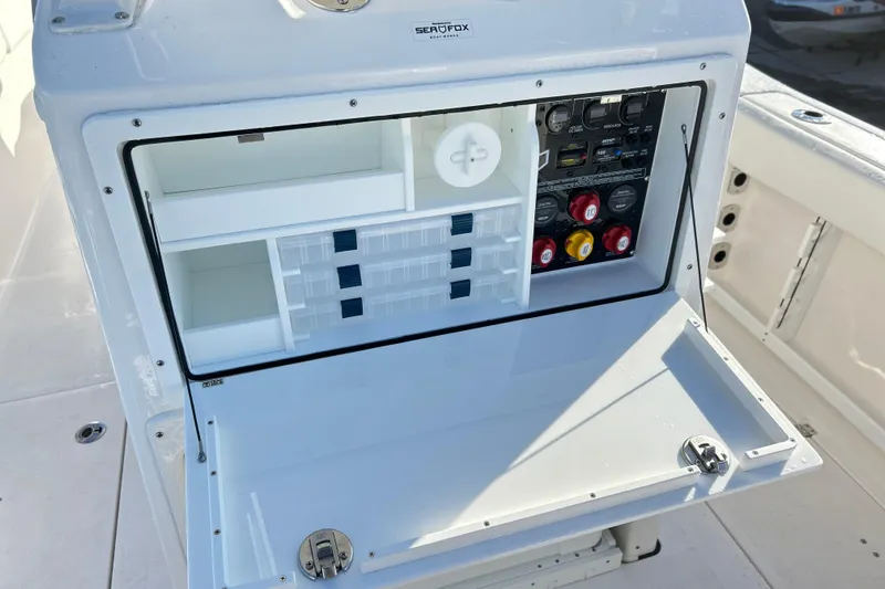  Yacht Photos Pics 2026 Sea Fox 288 Commander boat console with storage compartments and control panel.