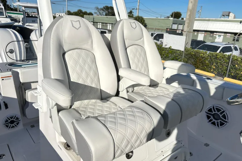  Yacht Photos Pics Luxurious seating on 2026 Sea Fox 288 Commander boat, featuring diamond-stitched upholstery.