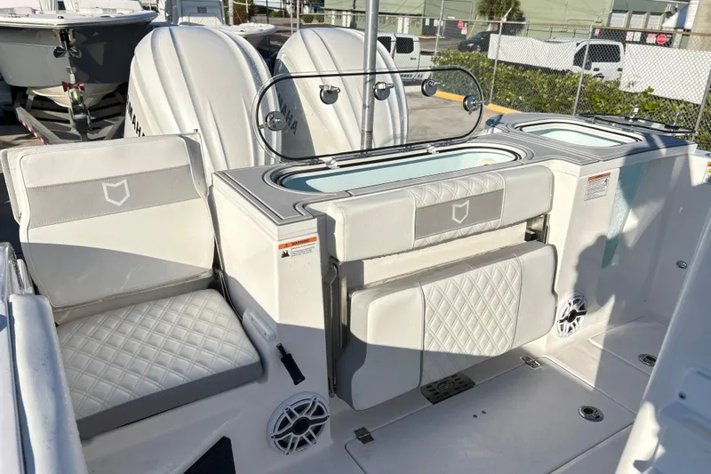  Yacht Photos Pics 2026 Sea Fox 288 Commander boat interior with seating and storage compartments.