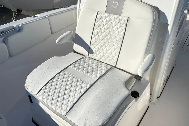  Yacht Photos Pics Luxurious seating on 2026 Sea Fox 288 Commander boat, featuring diamond-stitched upholstery.