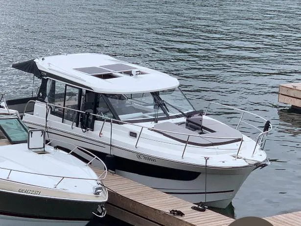  Yacht Photos Pics 2020 Jeanneau NC 1095 boat docked at a marina.