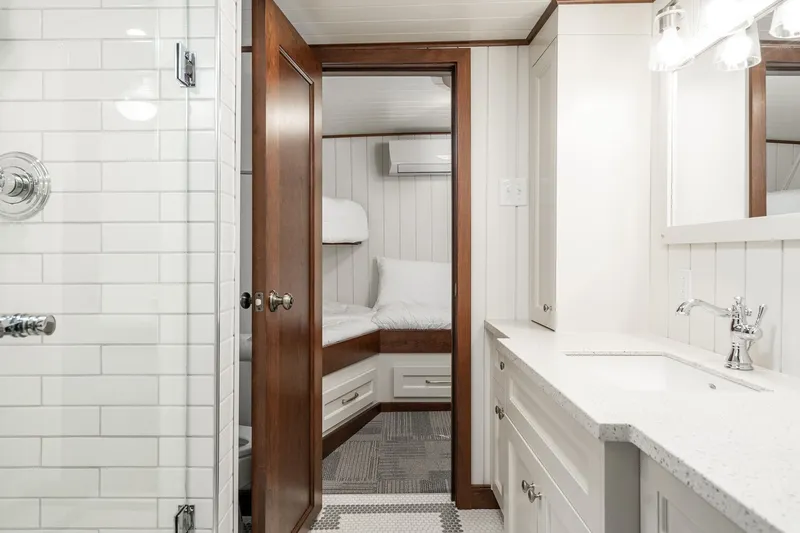 Anne S Pierce Yacht Photos Pics Luxurious 1982 Glovertown Shipyard exploration ship interior with modern bathroom and cozy cabin.