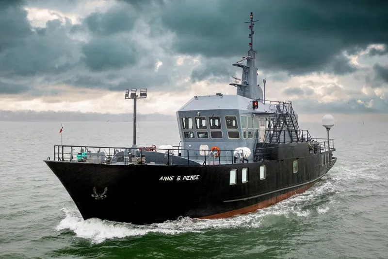 Anne S Pierce Yacht Photos Pics 1982 Glovertown Shipyard exploration ship navigating under cloudy skies.
