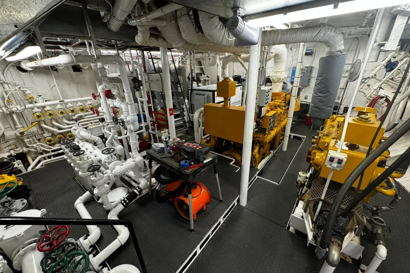 Anne S Pierce Yacht Photos Pics Engine room of 1982 Glovertown Shipyard exploration ship with machinery and pipes.