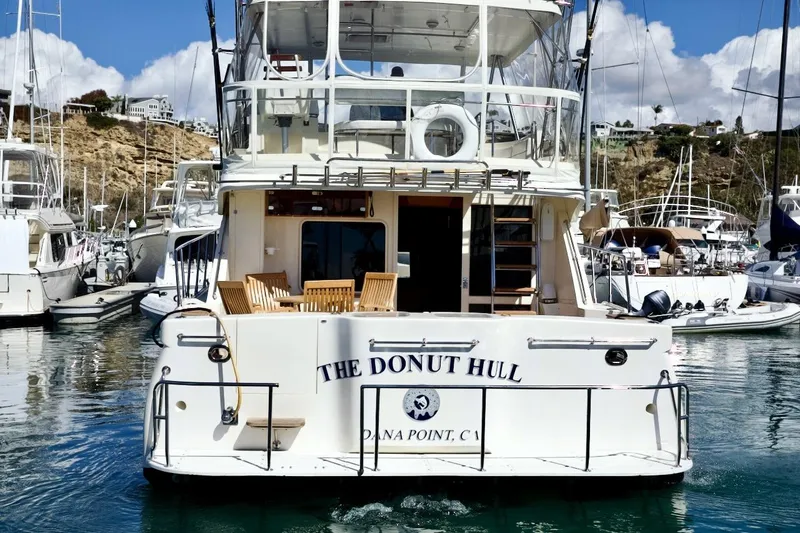 The Donut Hull Yacht Photos Pics 2002 Mikelson 50 Sportfisher yacht named "The Donut Hull" docked at Dana Point, CA marina.
