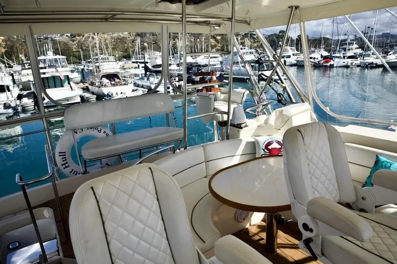 The Donut Hull Yacht Photos Pics Luxurious 2002 Mikelson 50 Sportfisher yacht interior with marina view.