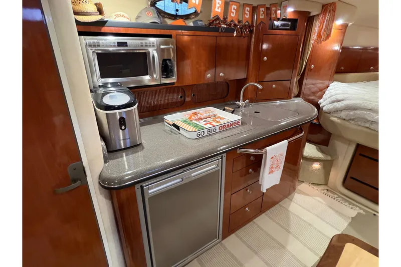  Yacht Photos Pics Luxurious 2007 Sea Ray 340 Sundancer yacht interior with modern kitchen amenities.