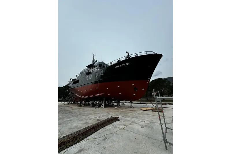 Anne S Pierce Yacht Photos Pics Custom Glovertown Shipyard vessel, 2021, docked for maintenance, showcasing sleek design and sturdy build.