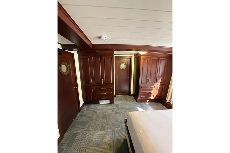 Anne S Pierce Yacht Photos Pics Luxurious ship cabin interior with wooden cabinetry, Custom Glovertown Shipyard, 2021 model.