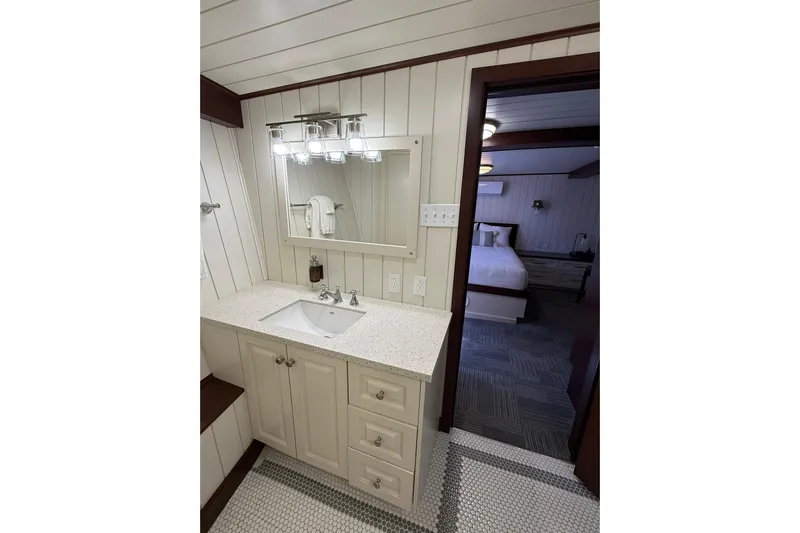 Anne S Pierce Yacht Photos Pics Luxurious ship cabin bathroom with modern vanity, Custom Glovertown Shipyard 2021 model.