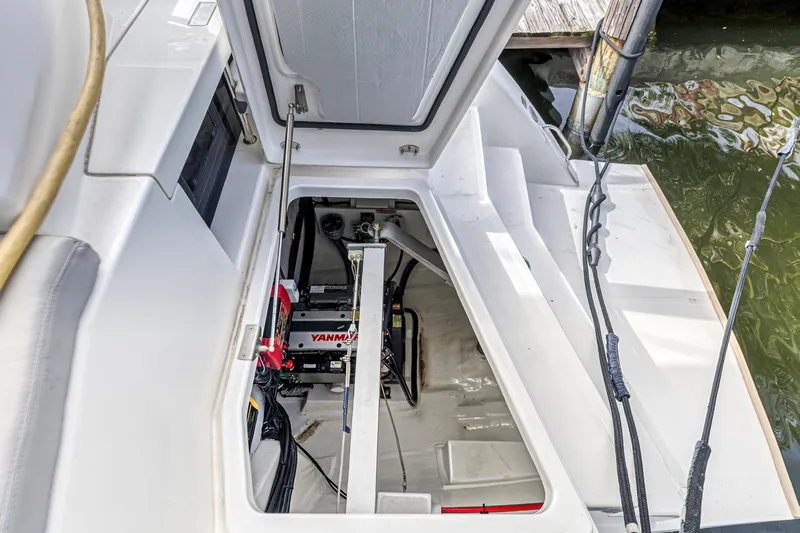  Yacht Photos Pics Open engine compartment of a 2021 Leopard 50 yacht, featuring a Yanmar engine.