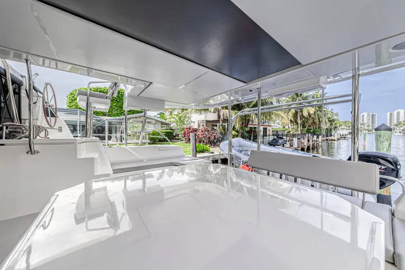  Yacht Photos Pics Luxurious 2021 Leopard 50 yacht interior with sleek design and waterfront view.