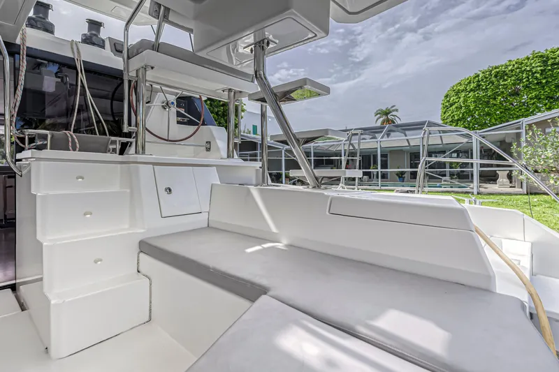  Yacht Photos Pics Modern Leopard 50 yacht interior, featuring sleek seating and storage, 2021 model.