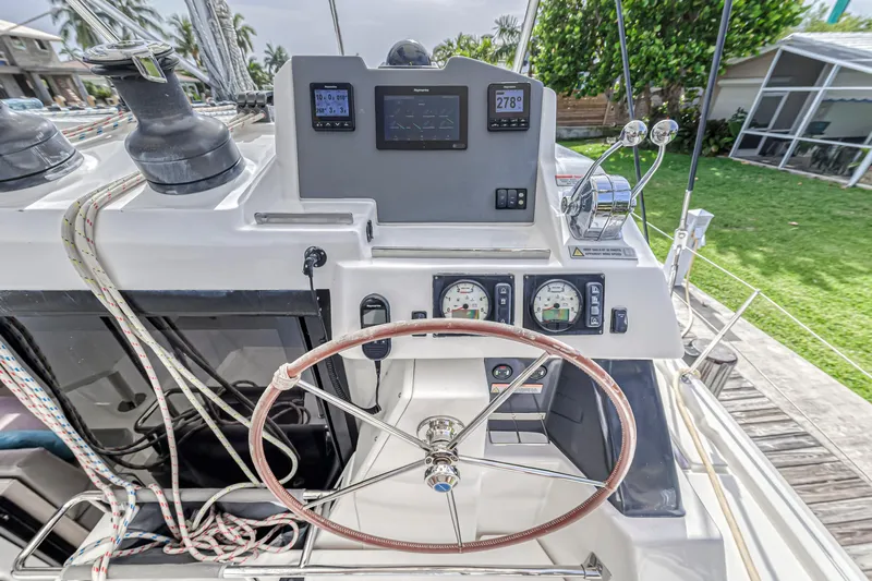  Yacht Photos Pics Helm of 2021 Leopard 50 yacht with navigation instruments and steering wheel.