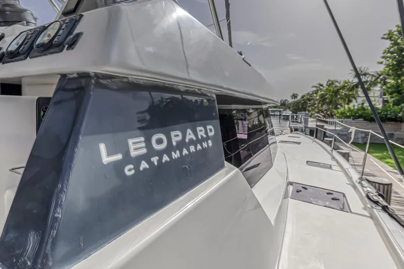  Yacht Photos Pics Leopard 50 catamaran, 2021 model, docked with visible branding and sleek design.
