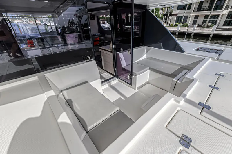  Yacht Photos Pics Luxurious seating area on a 2021 Leopard 50 yacht, featuring sleek, modern design.