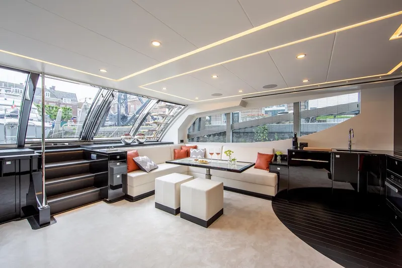  Yacht Photos Pics Luxurious interior of 2026 Van der Valk Beach Club 600 yacht with modern seating and large windows.