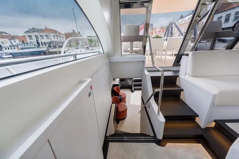  Yacht Photos Pics Interior of 2026 Van der Valk Beach Club 600 yacht with modern seating and stairs.
