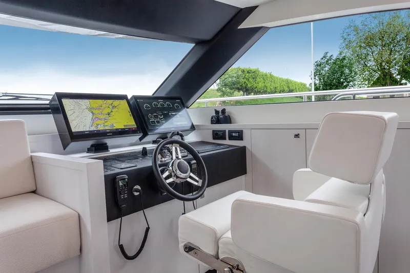  Yacht Photos Pics Modern helm station of the 2026 Van der Valk Beach Club 600 yacht.