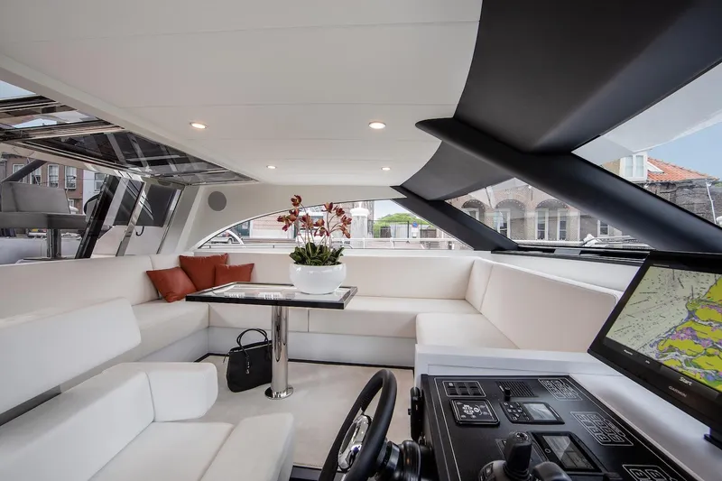  Yacht Photos Pics Luxurious interior of the 2026 Van der Valk Beach Club 600 yacht with modern seating and navigation.
