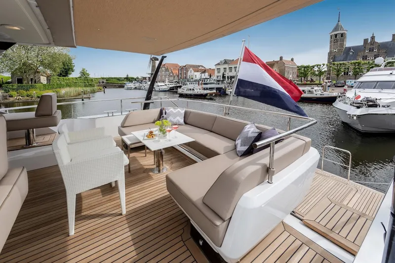  Yacht Photos Pics Luxurious deck of 2026 Van der Valk Beach Club 600 yacht in a scenic marina.