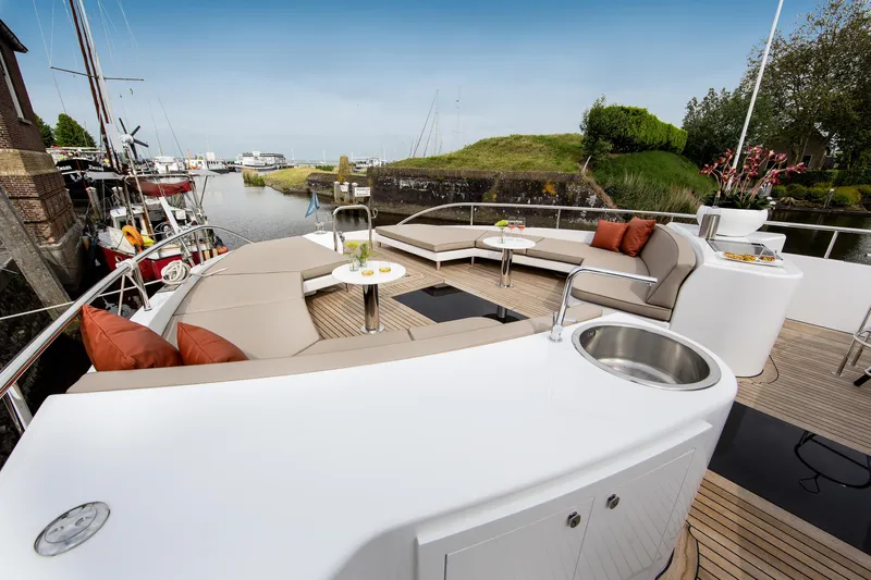 Yacht Photos Pics Luxurious deck of 2026 Van der Valk Beach Club 600 yacht with modern seating and amenities.
